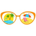 Sun lounger reflection glasses under an umbrella on a tropical beach. Royalty Free Stock Photo